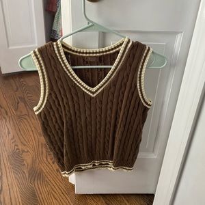 Brandy Melville brown (with cream details) sweater vest.